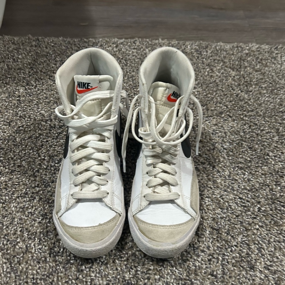 Nike White and Black High-Top Sneakers with Orange Logo